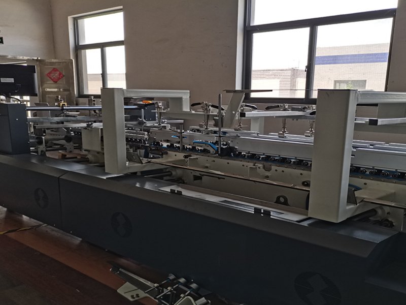 with carton gluing machine, we can paste and glue cardboard boxes and envelopes automatically and fast