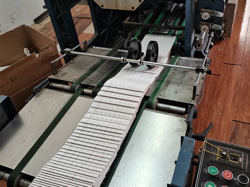 with this printed paper flyer folding machine, we could fold printed paper for flyers